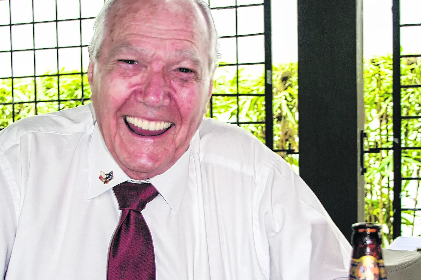 Sgt Cyril Gilbert: Back in Singapore in more recent times and enjoying a beer... very different from 1945. Photo: Stuart Lloyd.