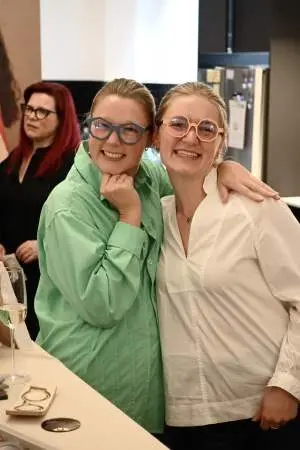 Zali Thomas and Georgie Jones trying on new season Nina Mur glasses at the event.