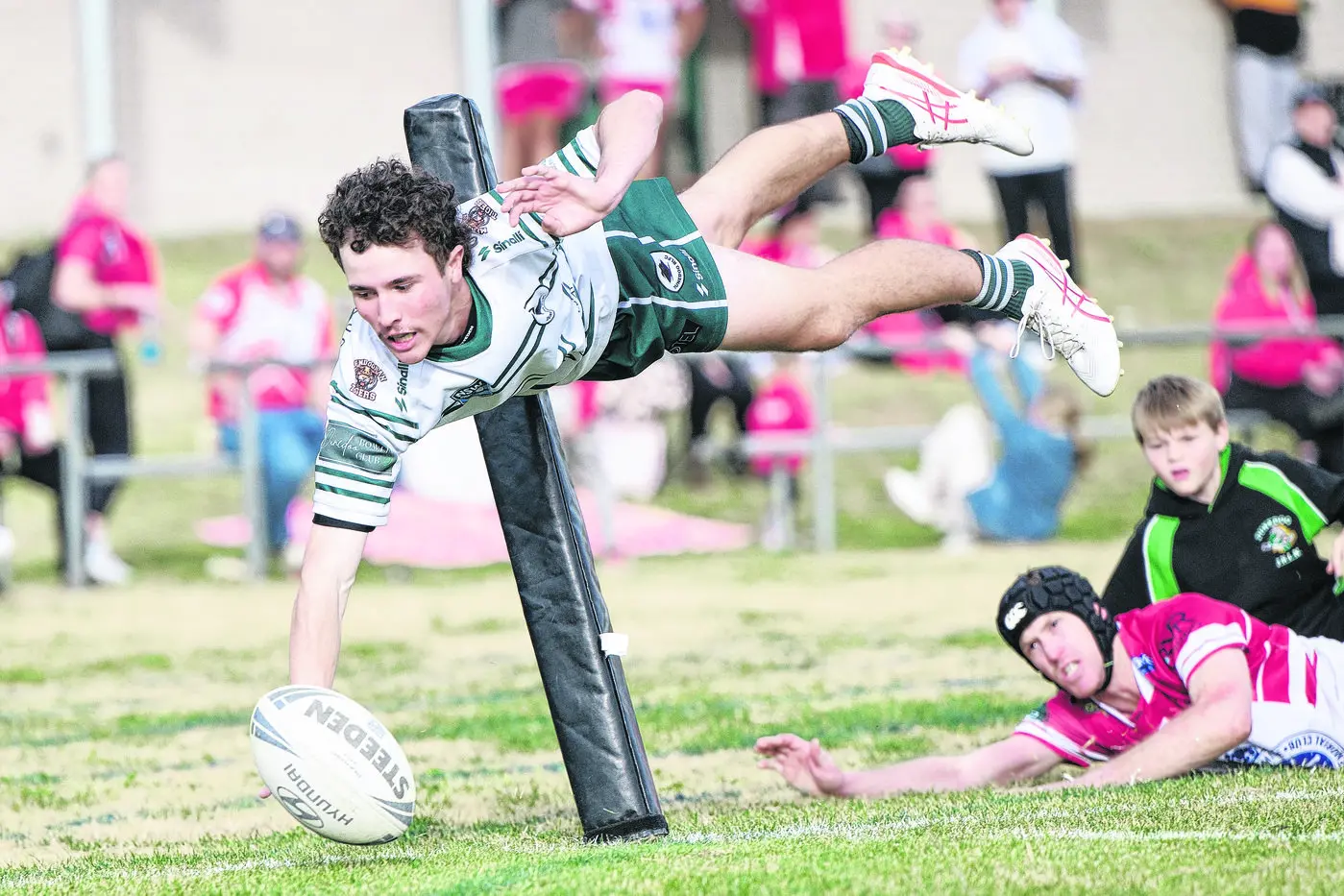 Dunedoo winger Jack Guan diving to score in the match against Narromine, Photo: Peter Sherwood Photography and Framing