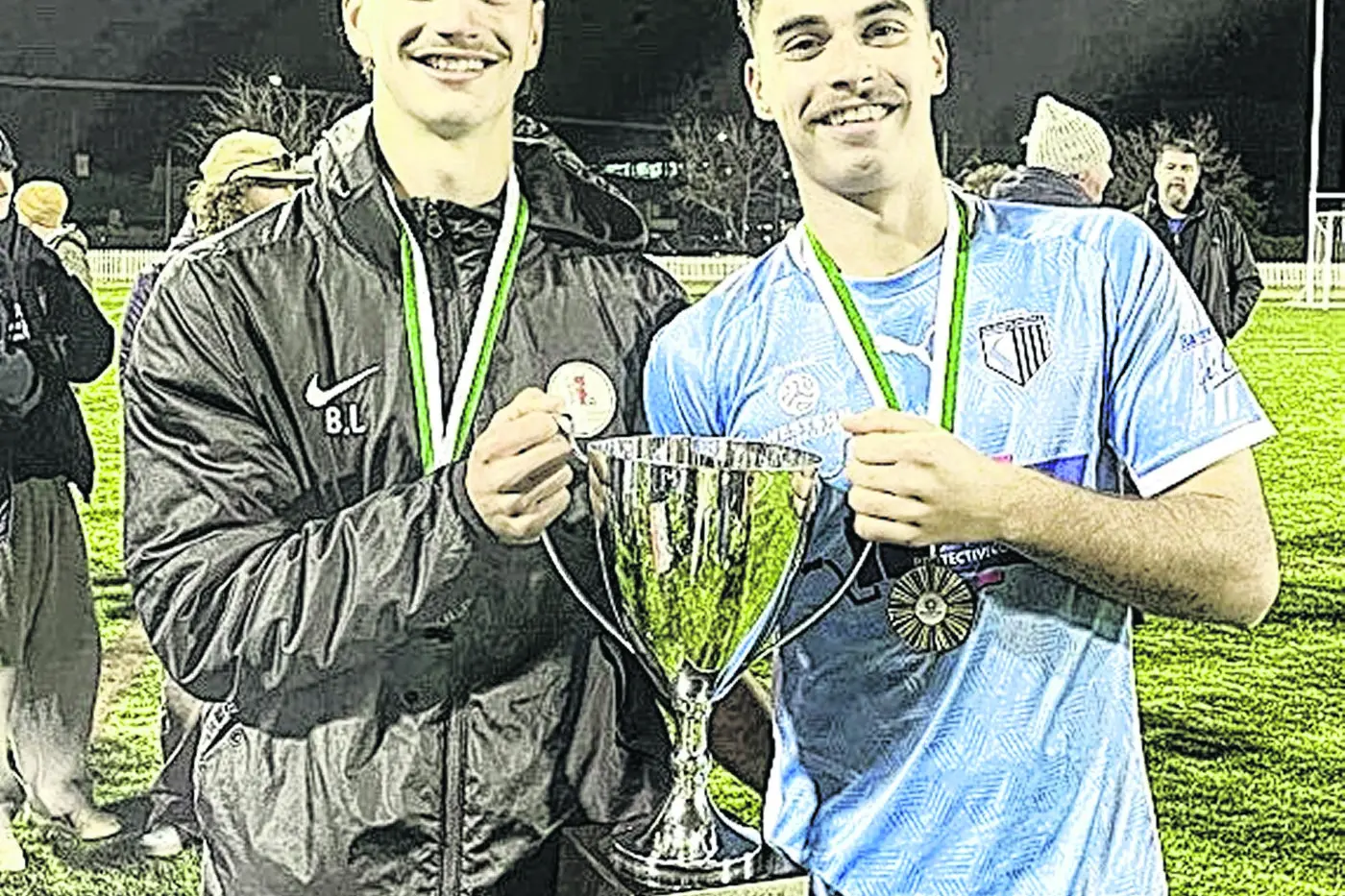 The \\u201CLetfalla Brothers\\u201D holding the trophy after Macquarie United\\u2019s Western Premier League soccer inaugural grand final win. All photos: Supplied