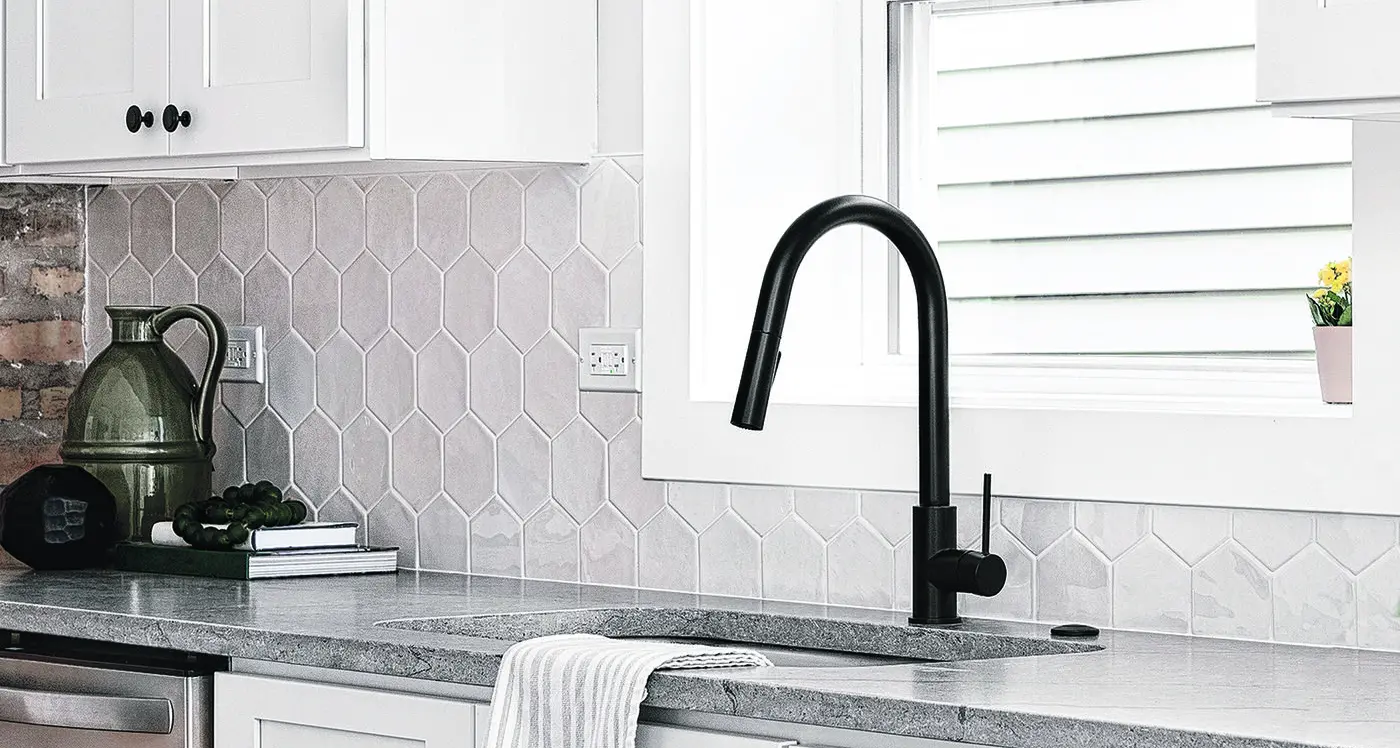 What are the advantages of a high-arc kitchen tap?