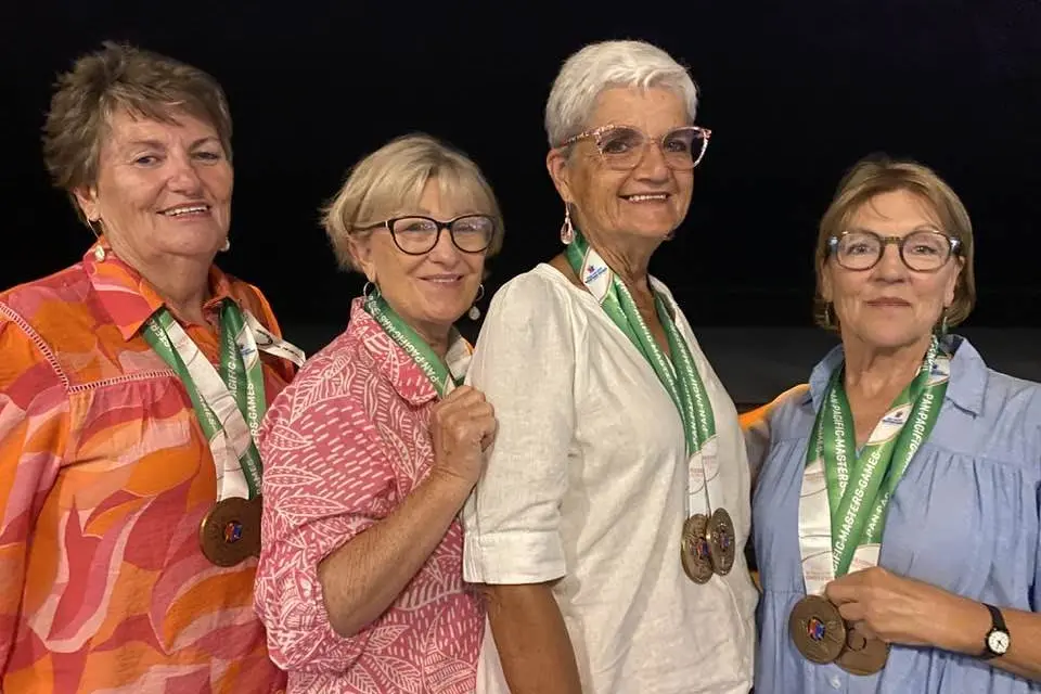 Winners are grinners: Members of Outback Dragons celebrate their big bronze medal finishes after a long weekend of competition on the Gold Coast. Photos: Outback Dragons.