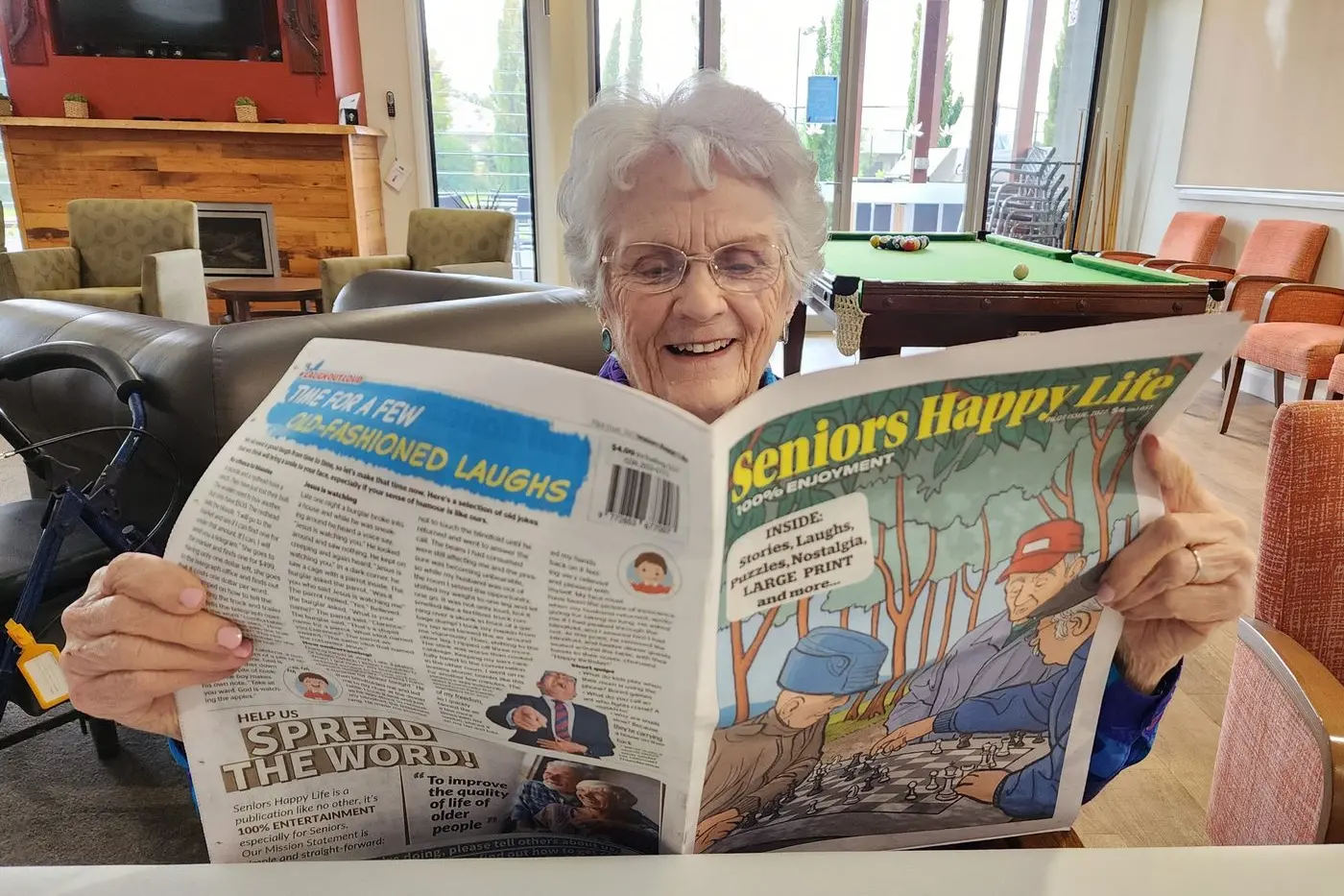 Dubbo newspaper-lover Mona Johnston is pictured checking out the first edition of \\u201CSeniors Happy Life\\u201D this week. Photo: Dubbo Photo News.