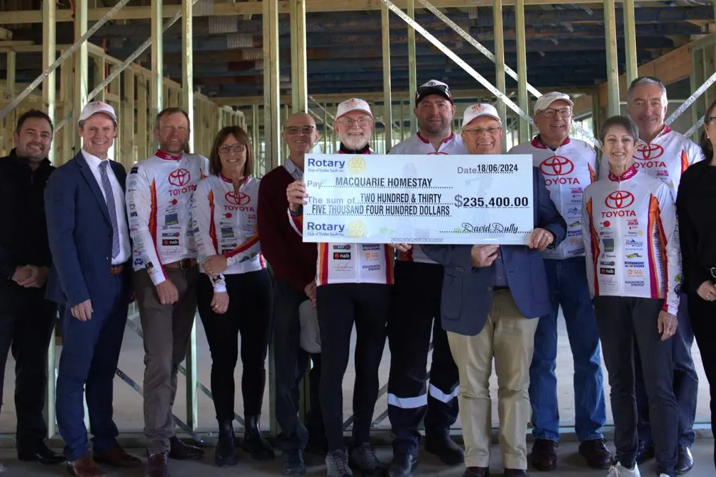Many of those involved in the OROC Fundraising ride that contributed to the cheque. From left: Jeremy Brown, Ben Thompson, Mathew Dickerson, Ben O\\'Brien, Trudy Griffiths, John Curley, Tony Geraghty, James Slender, David Duffy, Andrew Graham, Pam Dickerson, Denis Sheridan, Shannon Starr and Sam Peacocke. Photo: Supplied.\\n