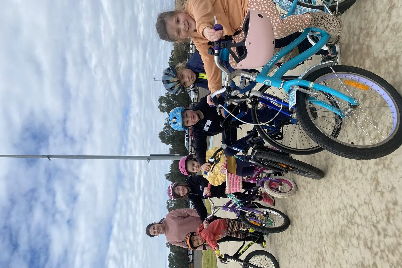 Back to front, dual Commonwealth Games gold medallist, Megan Dunn, with local kids Wilfred Louis, Norah Wallace, Stella Robertson, Carter Reakes, Thomas Tanswell and Oaklyn Irwin-Smith learning how to ride their bikes. Photo: Dubbo Photo News