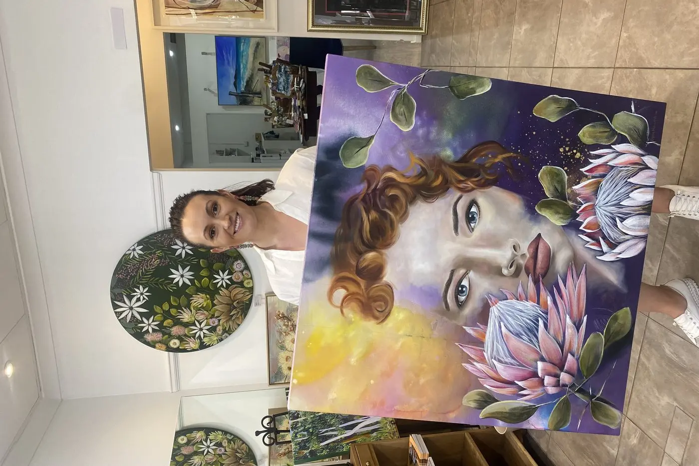 Laura Holland holds her original piece \\u2018The Queen of Kings\\u2019 that she will be displaying in Creative Fusion. Photo: Dubbo Photo News