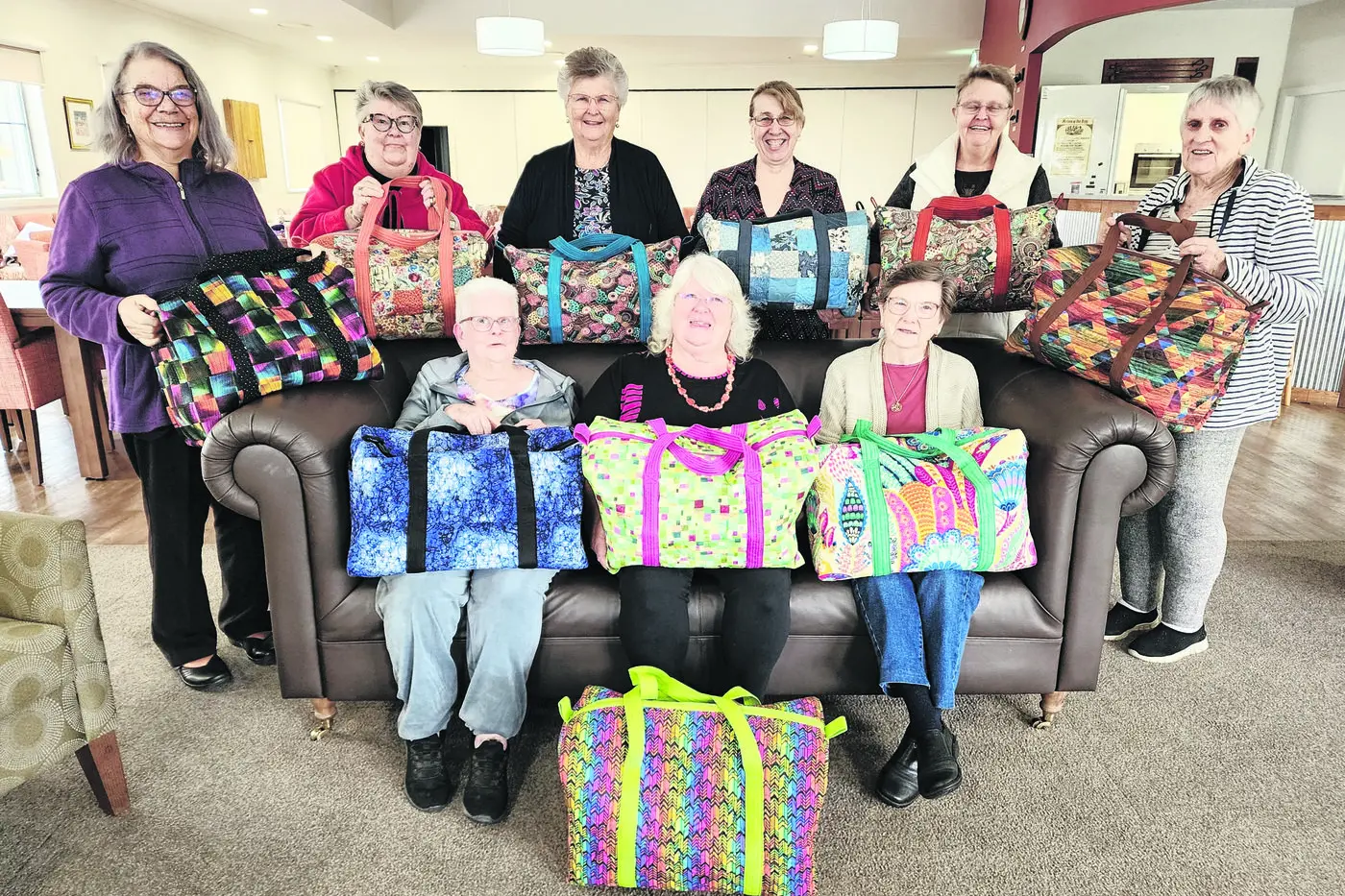 Macquarie Sewcialites: Back, Rhonda Millar, Janice Willets, Dot Hilton, Kerrie Smith, Julie McLane and Di Cullen, front, Alva White, Sue Bailey and Sue Hodges.