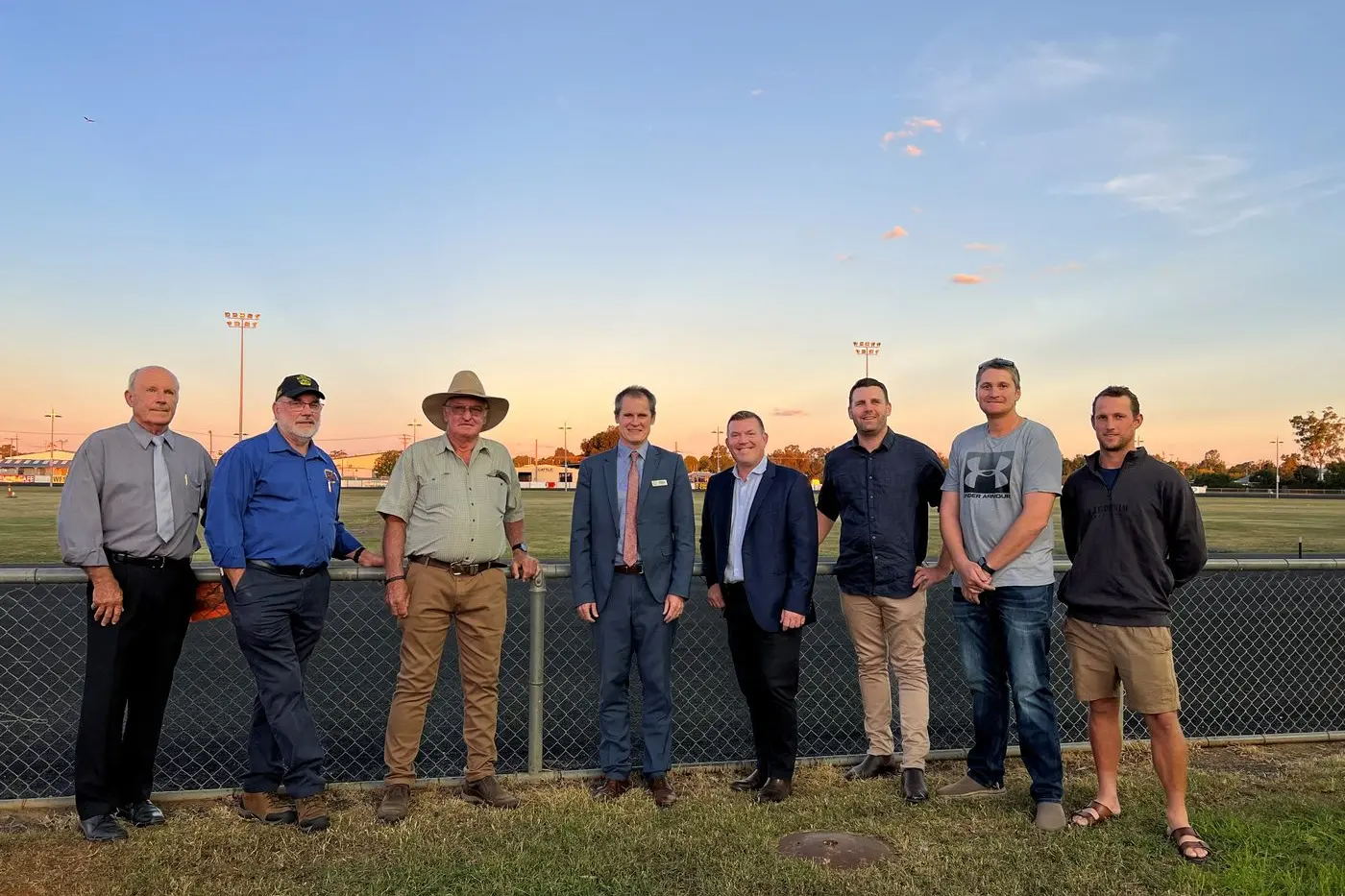 Turn on the lights! From left, new Harness Racing vice-president Robert Shanks, director David Wrigley, president John Lew, Dubbo mayor Mathew Dickerson, Member for Dubbo Dugald Saunders, with contractors Damien Rootes, Brock Harris, and Lachlan Peake. Photo: Supplied.