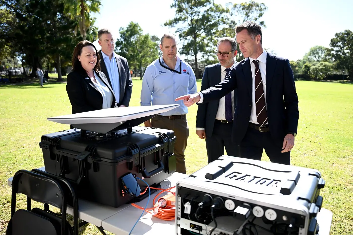 Premier Chris Minns and Emergency Services Minister Jihad Dib inspect new mobile connectivity units. Photo: AAP/Bianca De Marchi