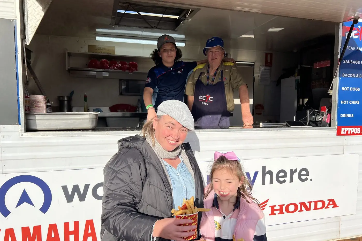 Tash Kelly and Lilliana Timpano sampled some hot chips from the PCYC catering van while they checked out all the trucks on show at the Golden Oldies. Photo: Dubbo Photo News.
