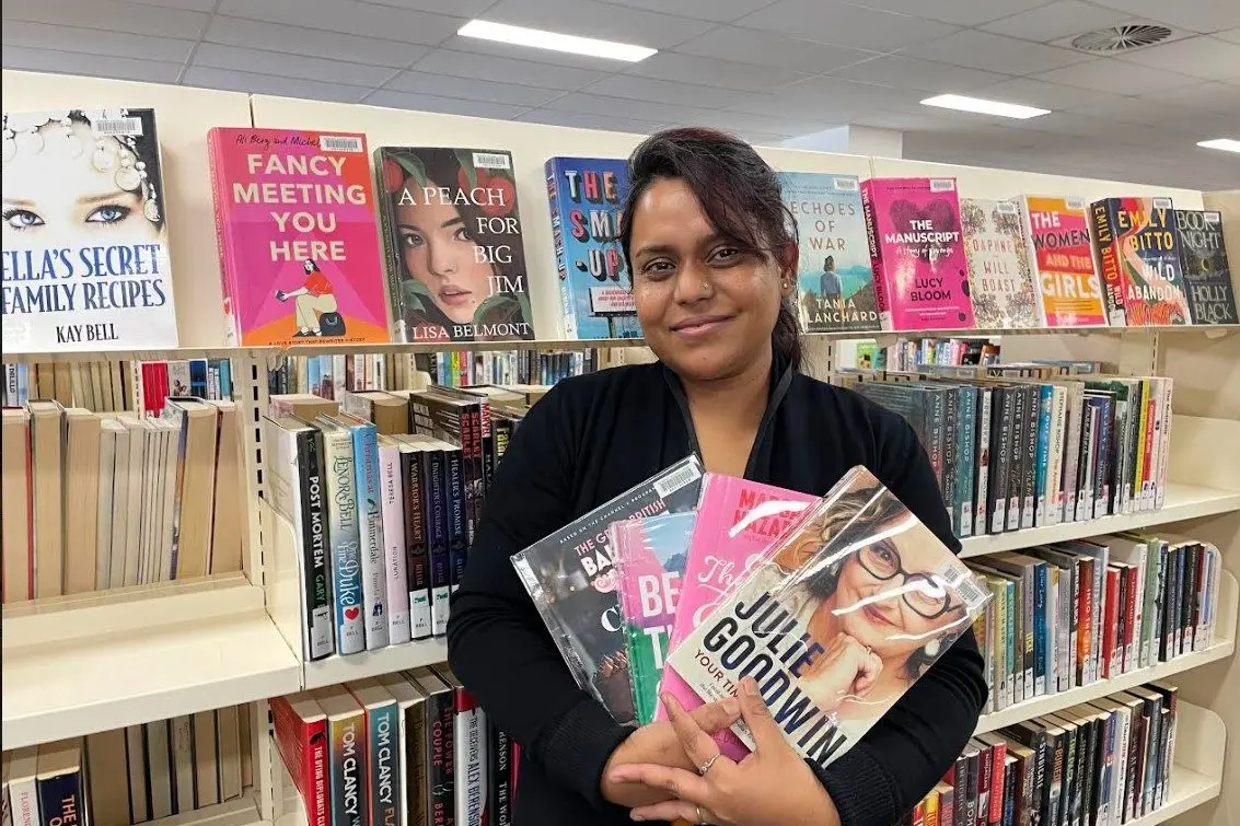 Winter is a great time to enjoy a good book, with Macquarie Regional Library\\u2019s Reading Challenge on now. Library Assistant Ferdous Begum with some of the variety of publications on offer at the Dubbo branch. Photo: Supplied.