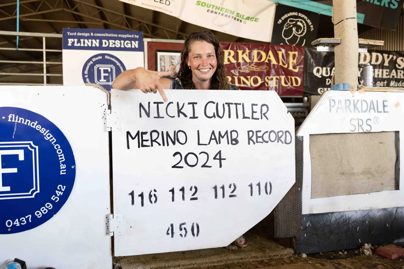 Nicki Guttler after breaking the eight-hour world record for a woman shearing merino lambs at Parkdale SRS Merino Stud. Photos: Courtesy Noni Carroll. 
