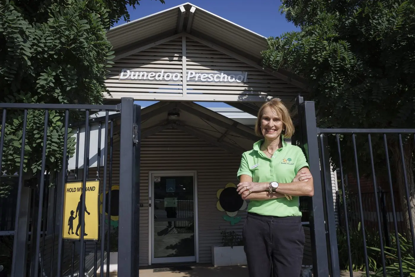 Director Robyn Croft standing outside Dunedoo Pre-School Kindergarten. Rural communities such as Dunedoo which are \\'at the heart\\' of the renewable energy transition will benefit from local grants. Photo: AAP/NSW Government