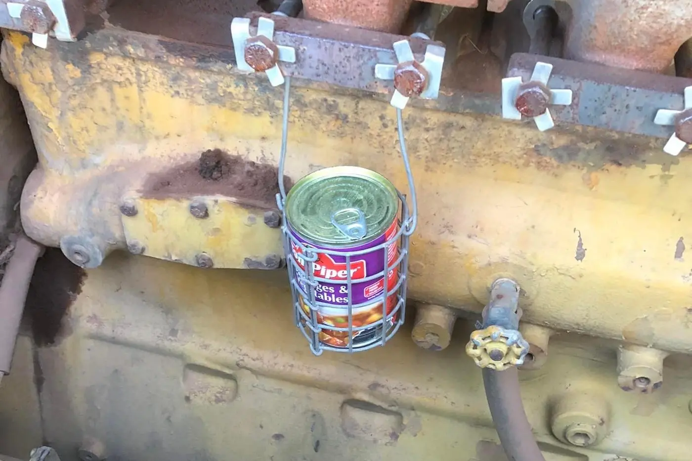 Rick Vette\\'s attention to detail and quality control are on full show in this photograph of his cooking basket, coupled to the engine on his bulldozer. Photo: Supplied.