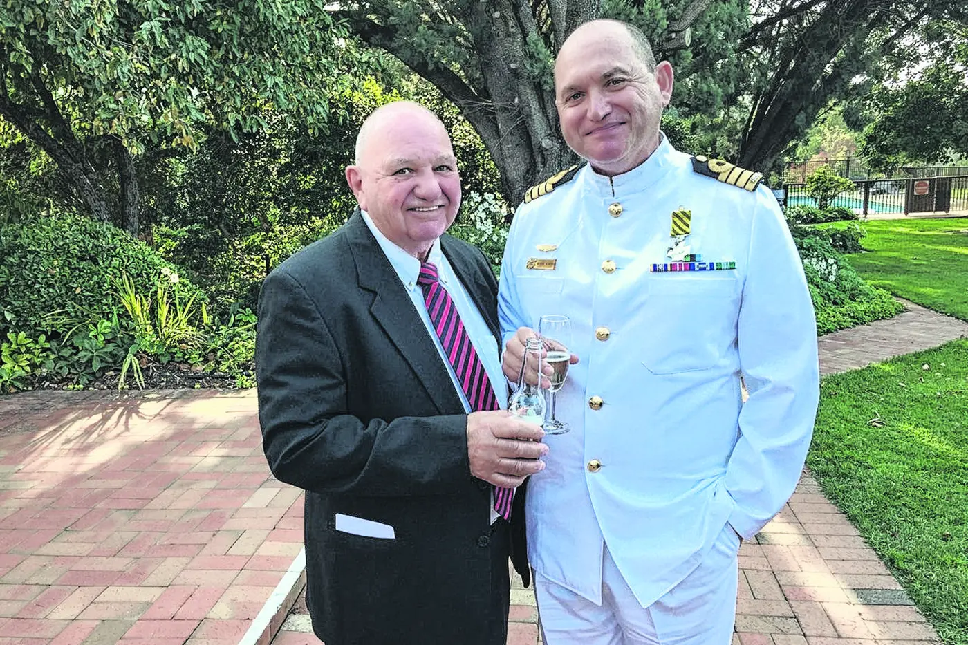 Commodore Anthony Klenthis (right) with his father George Klenthis. Commodore Klenthis was named in the King\\u2019s Birthday honours list as a Member of the Order of Australia. Photo: Supplied.