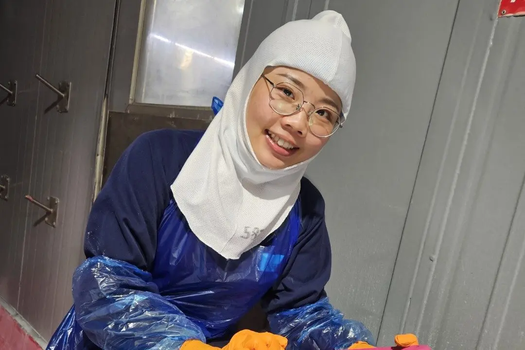 Fletcher International Exports meat trimmer Lillian Chen. Photo: Supplied