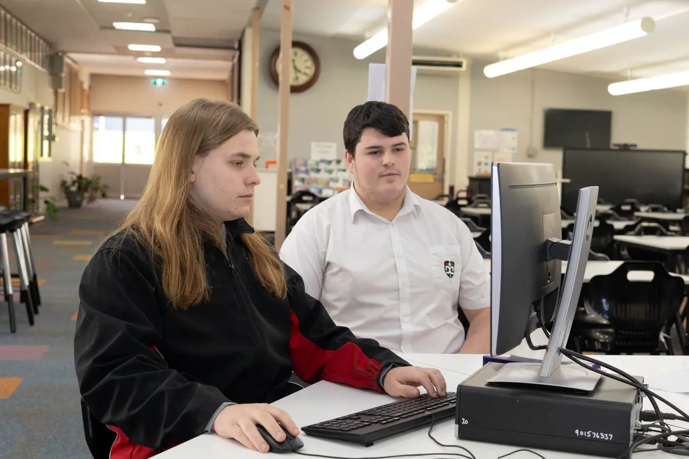 Two tech-savvy local lads Rocco Wrigley and Nathan Batten from Dubbo College Senior Campus recently completed a week-long Virtual Work Placement Program, offering hands-on experience with cloud computing. Photo: Supplied.
