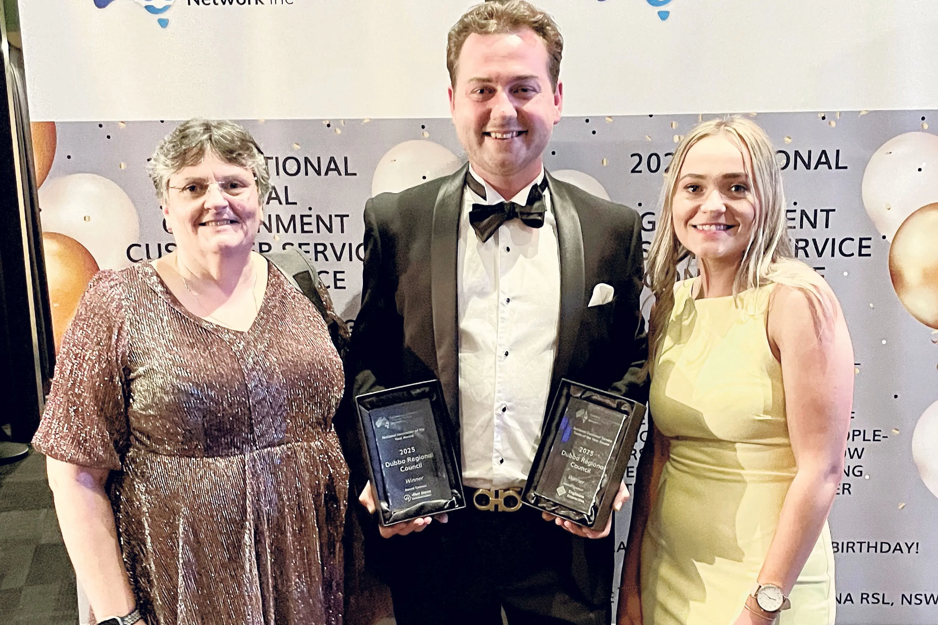 <p>Two awards for Council\\'s frontline staff at the recent  2025 National Customer Service Awards in Ballina, from left, Customer Experience Officers Lee-Ann Hartley and Monique Feltham with Customer Experience Team Leader Lachlan Cusack. Photo: Supplied</p>\\n