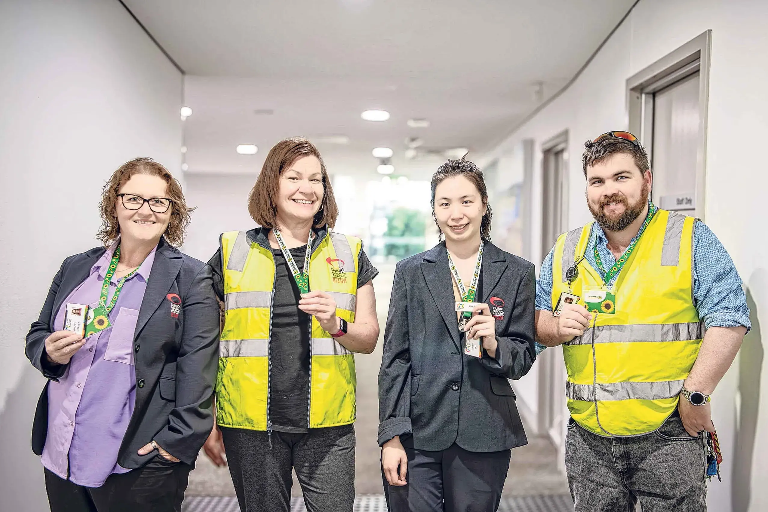 <p>Dubbo Regional Airport staff displaying the Hidden Disability Sunflower following implementation of the accessibility support program at the facility this month. Photo: DRC</p>\\n