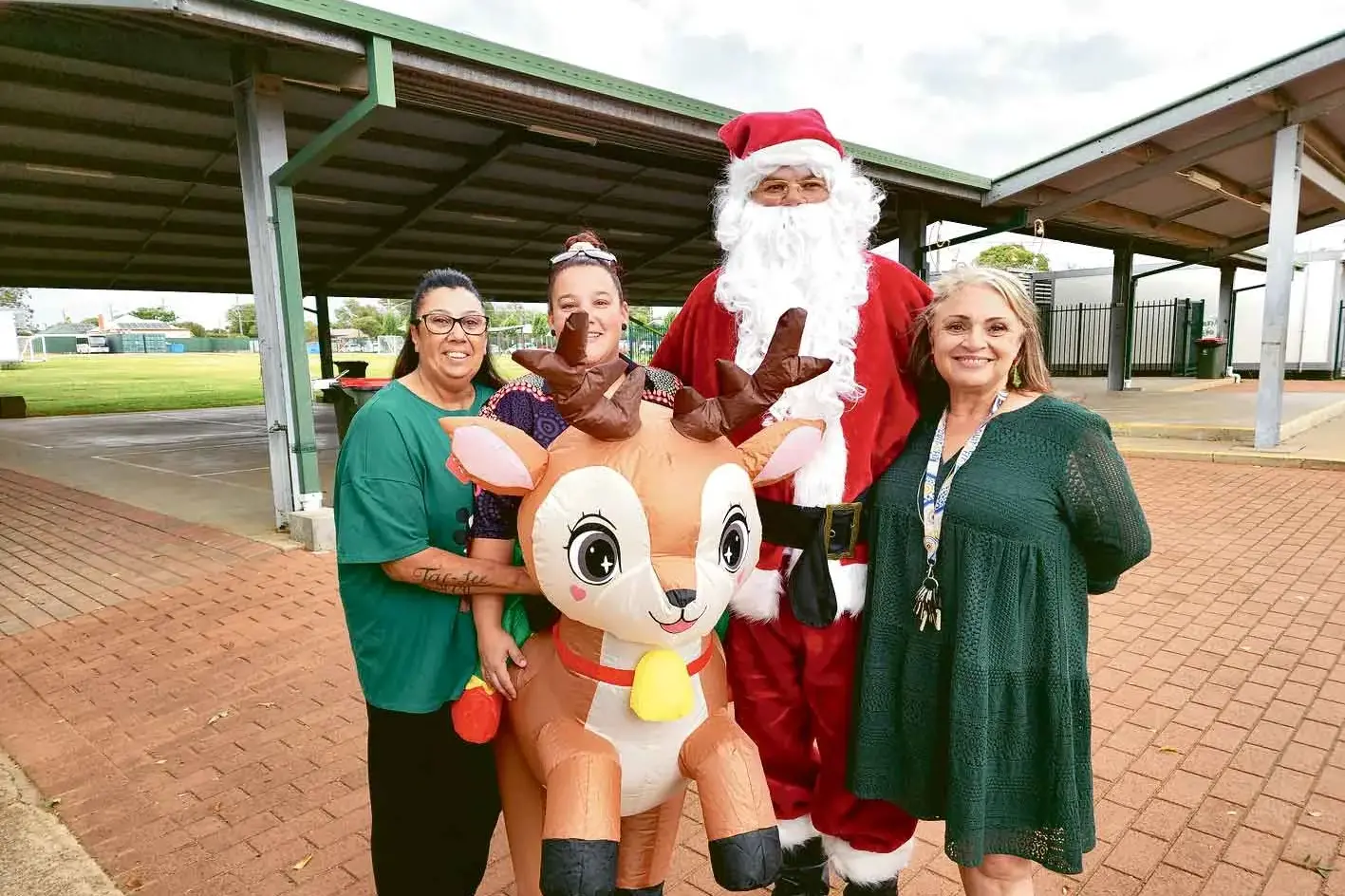 <p>Christmas concert fun at Dubbo West Public School. Here we have Sharon, Hayley, Santa and Jody. Photos: Dubbo Photo News</p>\\n