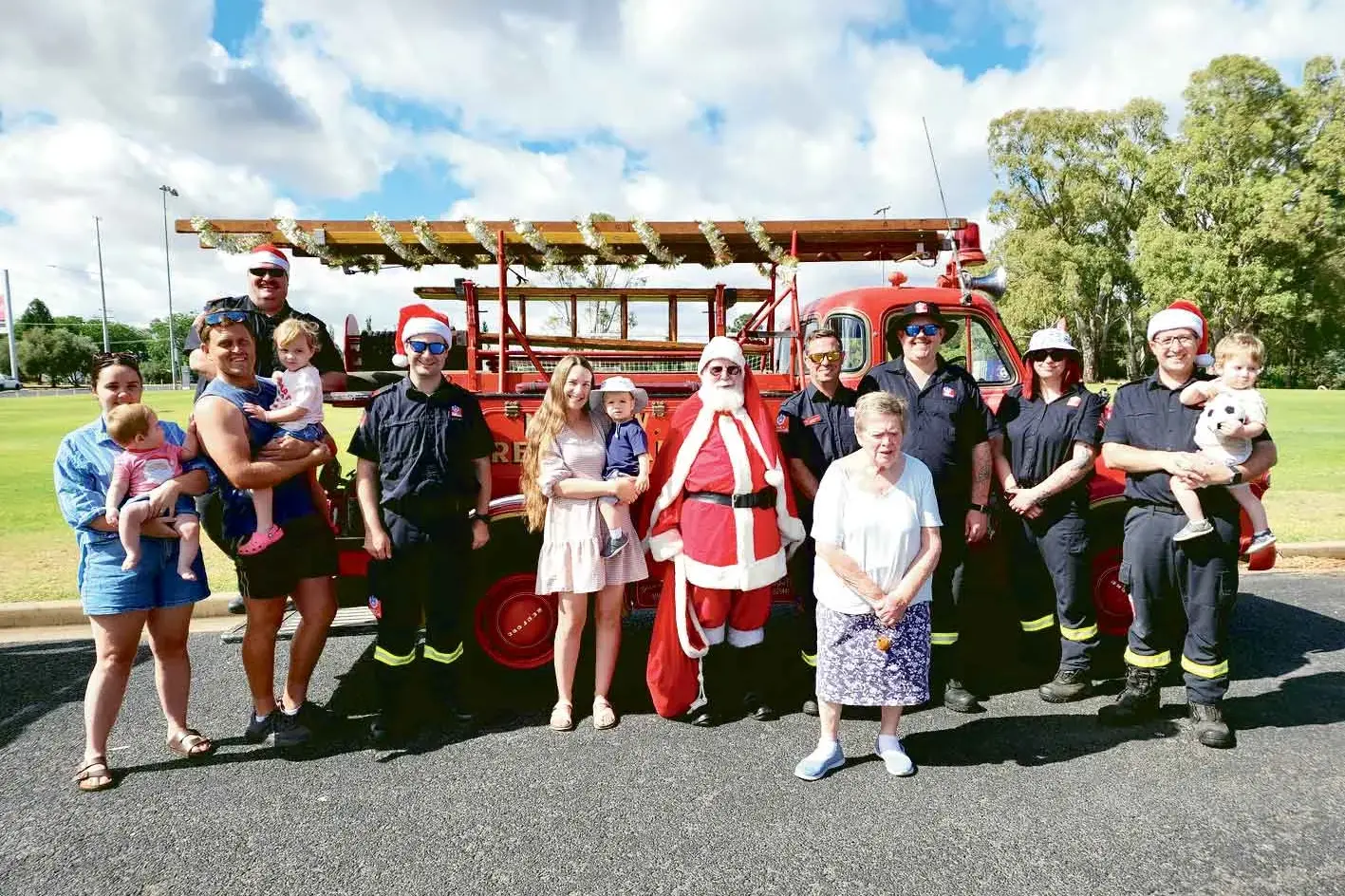 <p>Everyone wanted a photo with the 1964 Bedford Fire Truck. Photo: Dubbo Photo News</p>\\n