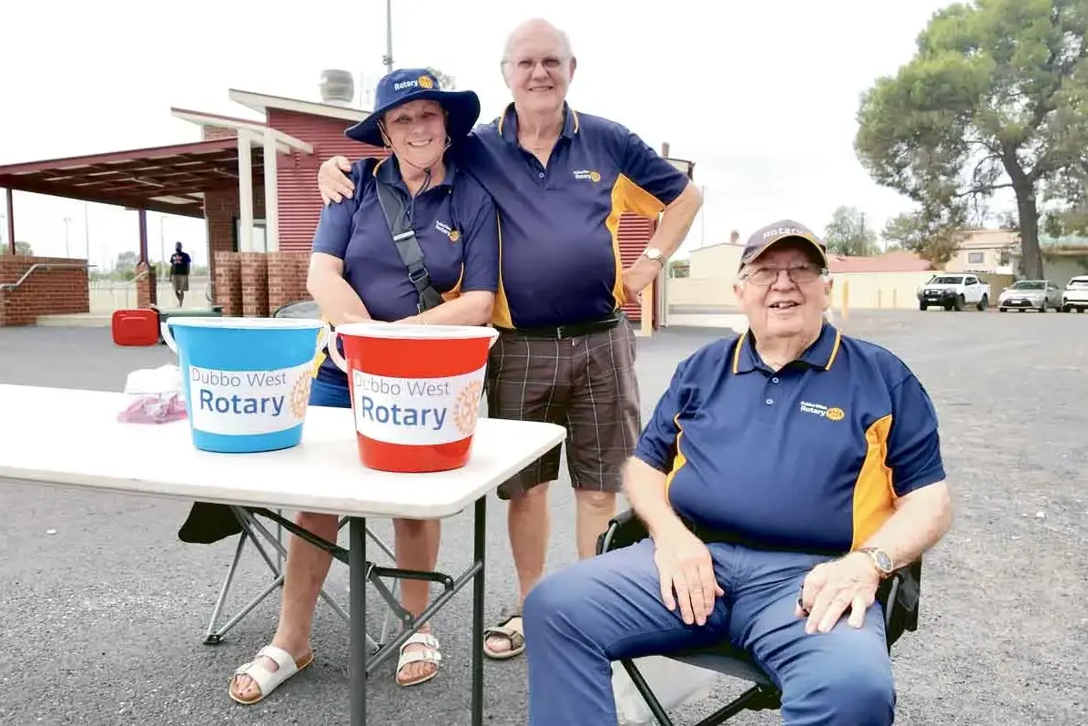 <p>Rotarians Margaret Bernie, Peter Tarlinton and Bert McLellan accepting gold coin donations at the Community Carols by Candlelight, sadly cancelled due to bad weather. Photo: Dubbo Photo News</p>\\n