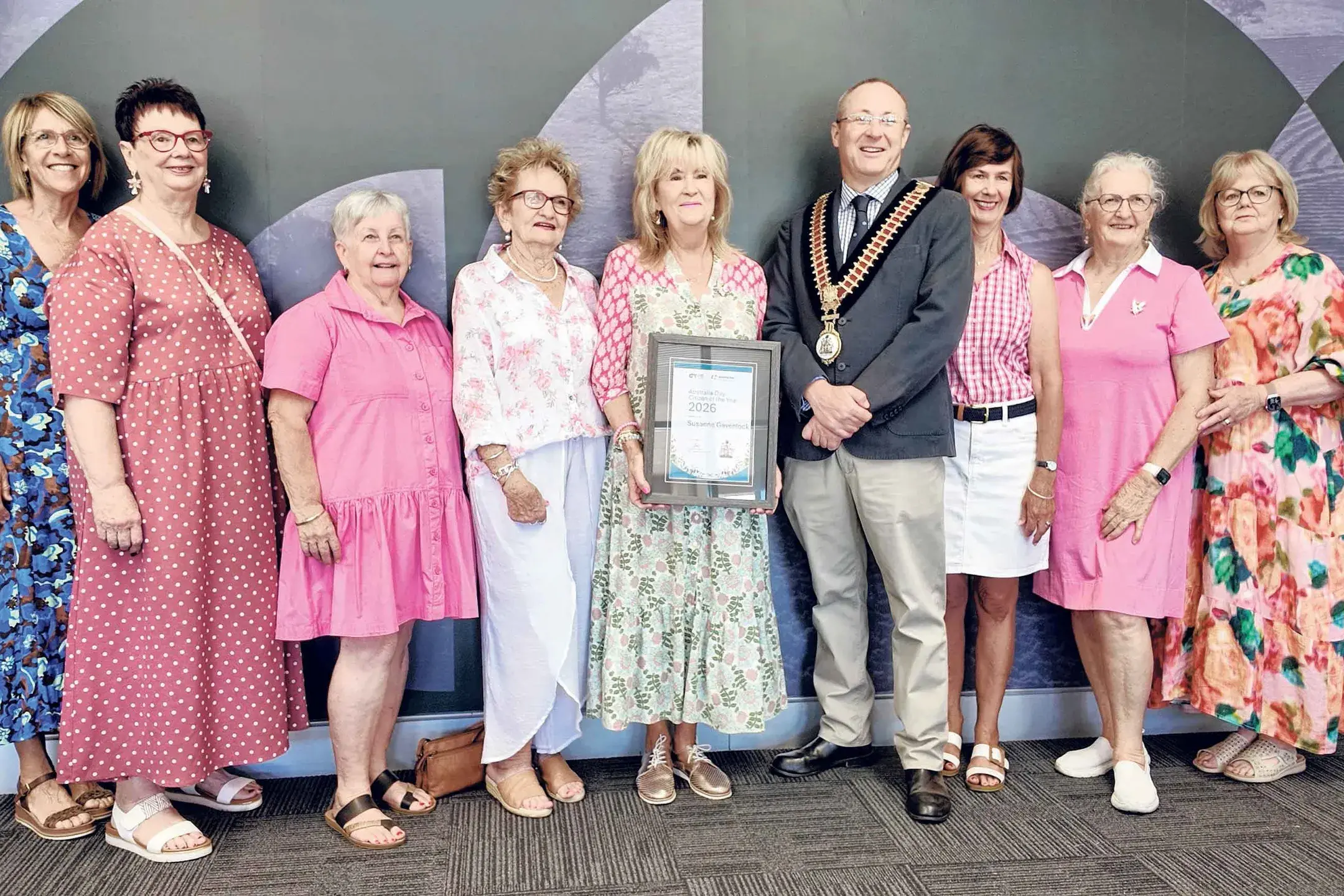 <p>Sue Gavenlock and Mayor Black (centre) with some of the many Pink Angel volunteers.</p>\\n
