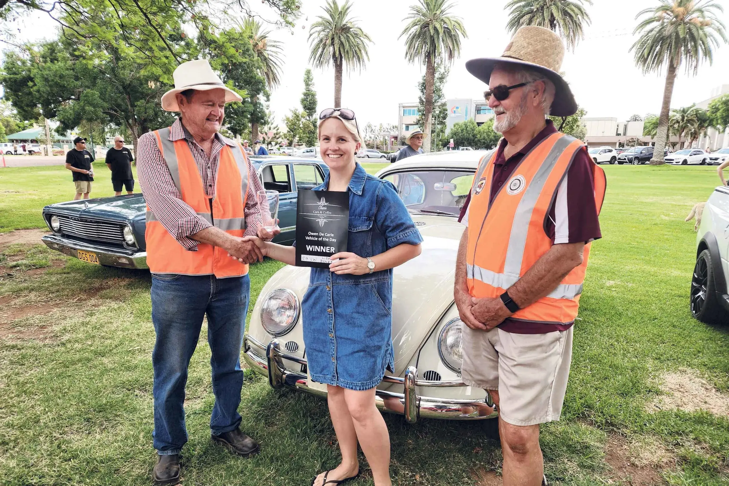 <p>At Dubbo Classic Cars and Coffee on Sunday, February 1, the Owen De Carle Vehicle of the Day went to Lisa Bynes and her 1959 VW. Lisa Bynes (middle) with Tom Warren and Merv Starr from Dubbo Antique Automobile Club Inc.</p>\\n