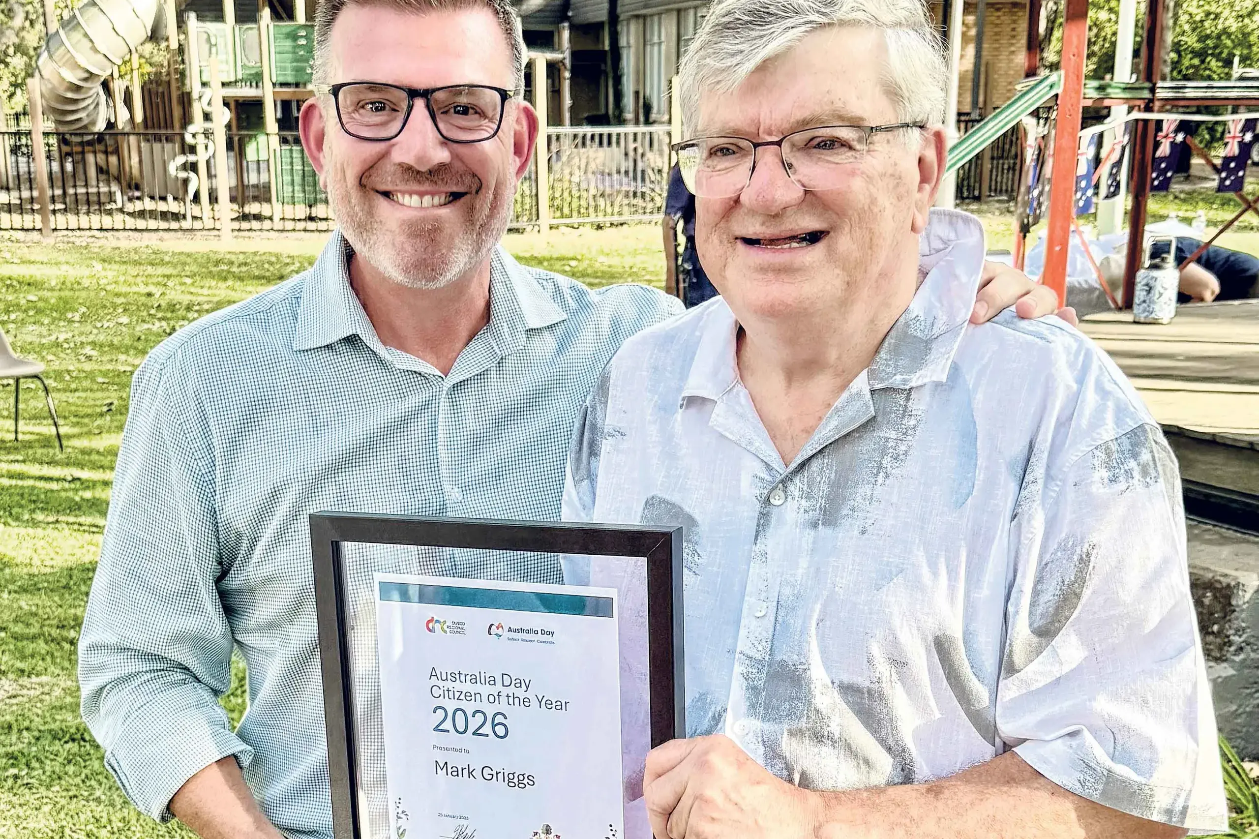 <p>Local editor and all-round volunteer and Wellington contributor, Mark Griggs, was named as Wellington\\u2019s Citizen of the Year at the recent Australia Day awards and is seen here with State Member, Dugald Saunders. Photo: Dubbo Electorate</p>\\n