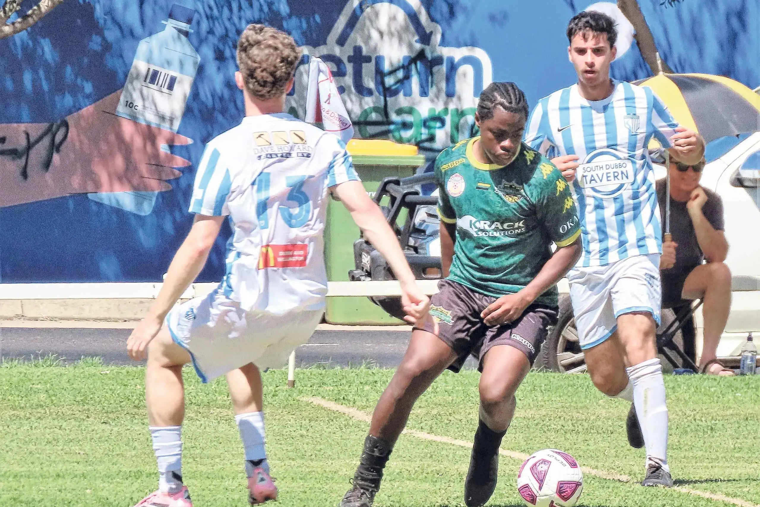 <p>There was plenty of give-and-take as Western Premier League Champions, Macquarie United, went down 5-0 hosting a strong Sydney West combination in Marayong FC in the Australia Cup. Photo: Dubbo Photo News/Ken Smith</p>\\n