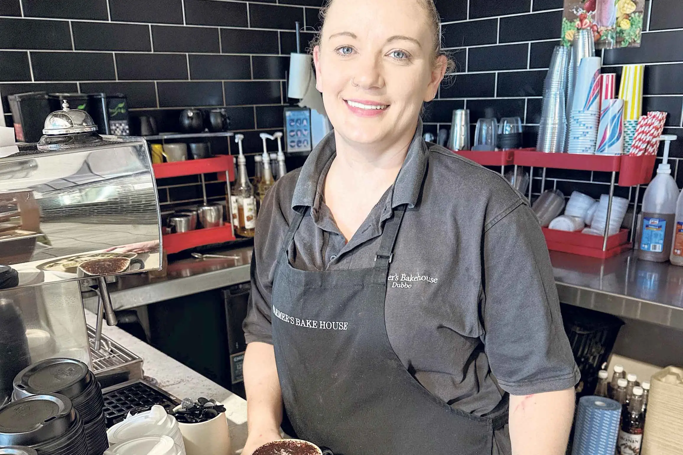 <p>Kylie lovers her work as a manager/barista. Photo: Supplied. </p>\\n