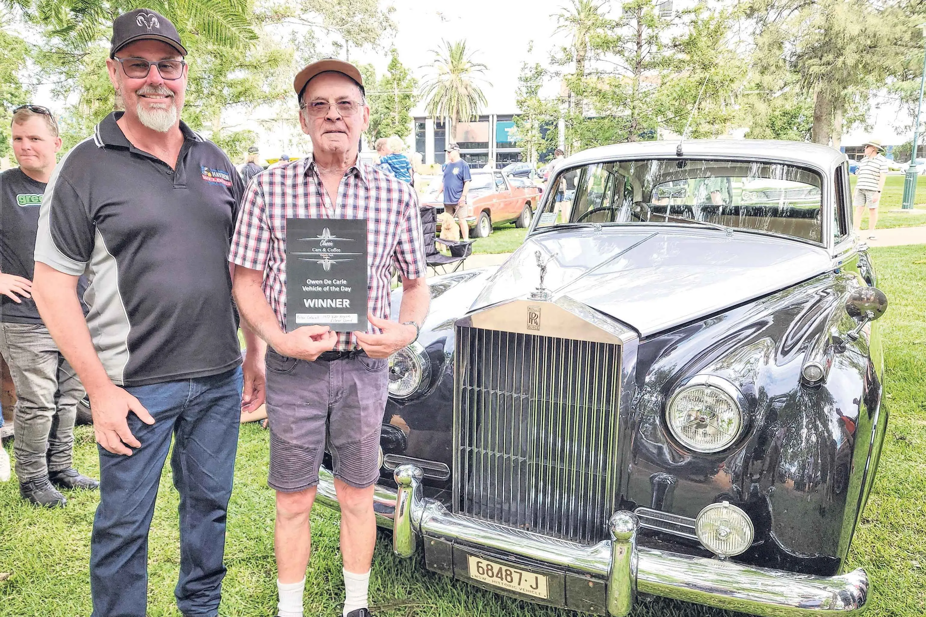 <p>Col Hayden and Peter Colwell, winner of the March 2026 Owen De Carle Vehicle of the Day, with Peter\\'s immaculate 1957 Rolls Royce Silver Cloud. Photos: Dubbo Photo News</p>\\n
