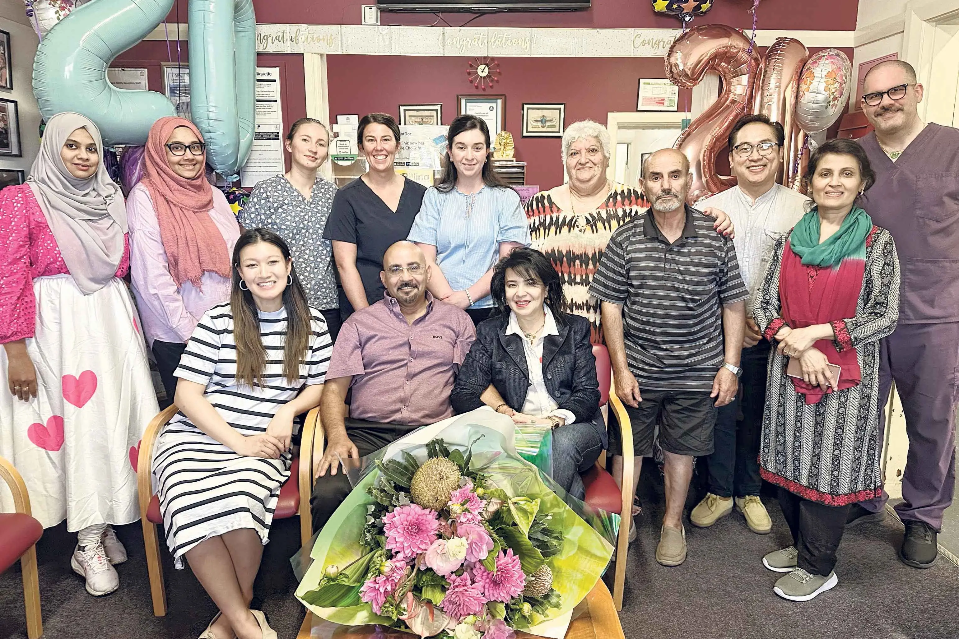 <p>Celebrating 20 years: Standing (L-R): Iffat, Faiza, Katie, Bianca, Krystal, Marie, Antoune, Chirag, Amma, and Nelson. Seated: Jen, George, and Amal. Photo: Dubbo Photo News</p>\\n