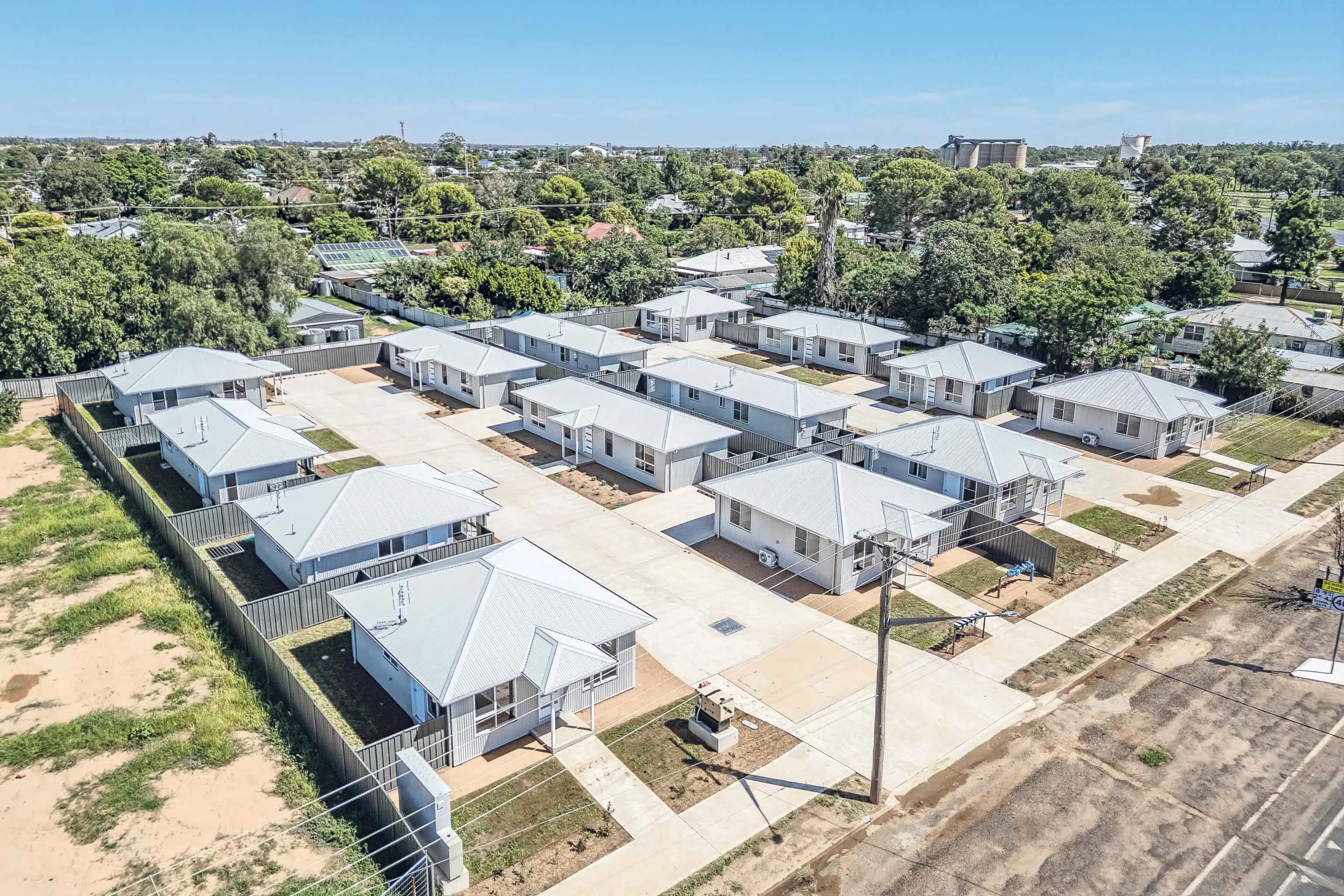 <p>Aerial view of the newly completed site providing new social housing in Narromine. Photos: NSW Government</p>\\n