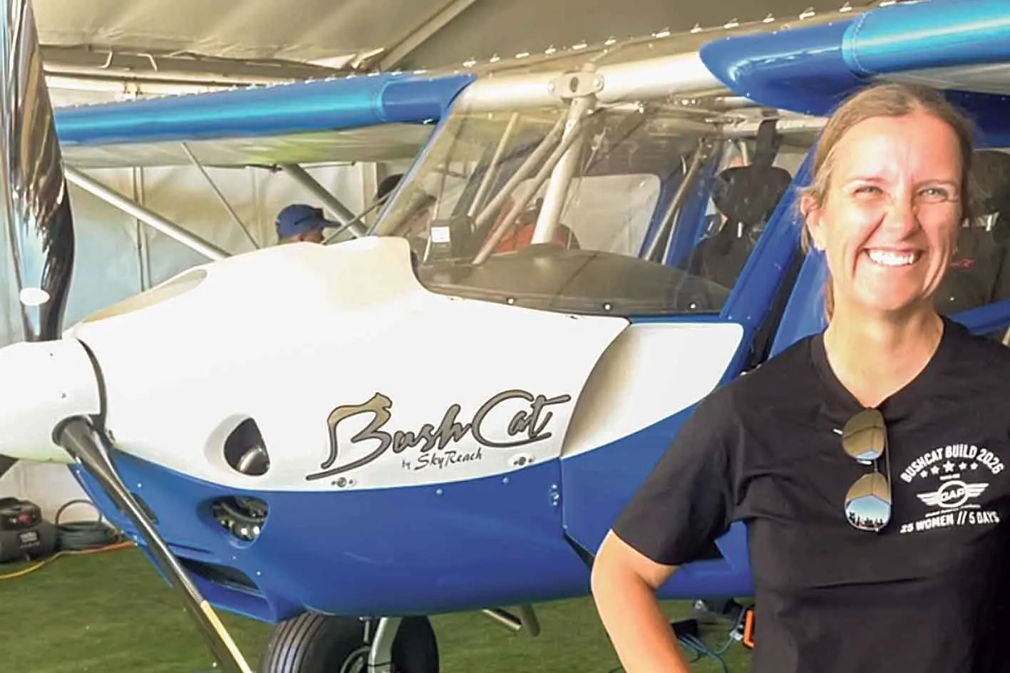 <p>Grace Walker with the BushCat aircraft she helped build with 24 other women in Parkes late last month. Photo: Flying With Grace</p>\\n