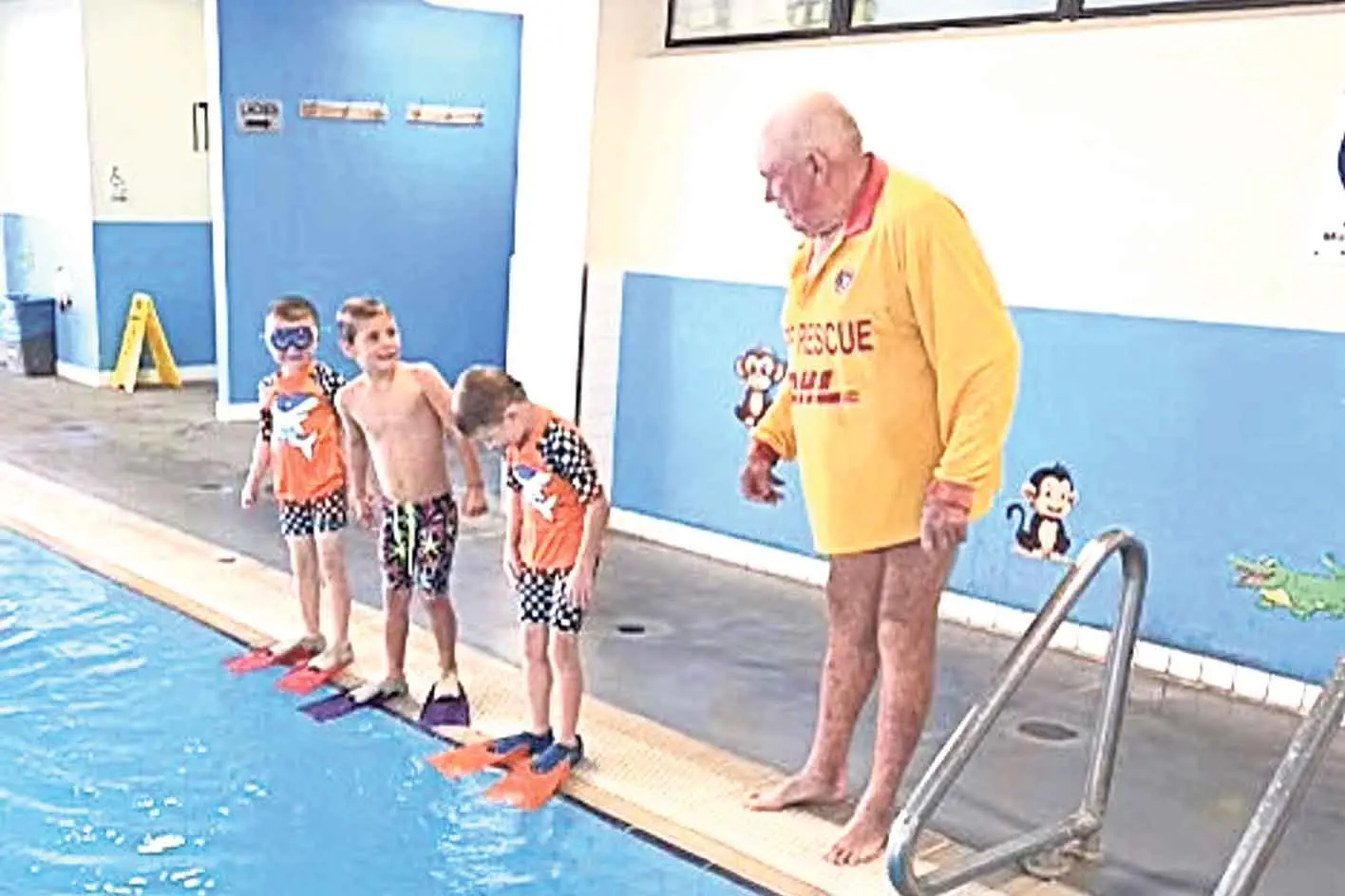 <p>Henry Wilcockson with Toby Barling and Marg Ross\\u2019 grandsons at the most recent Dubbo Ducks swim meet. Photo: Supplied.</p>\\n