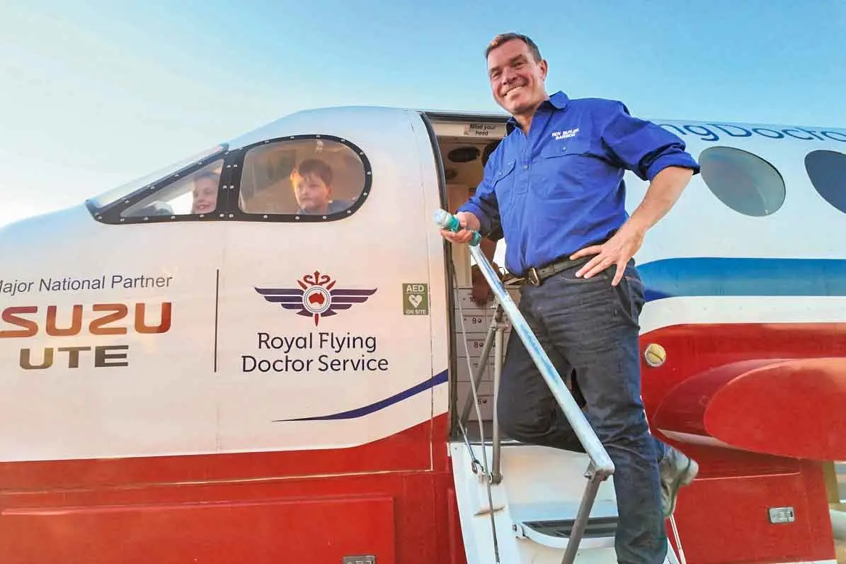 <p>April, 7, and Lucas, 5, in the cockpit of the RFDS mobile education unit with Barwon MP Roy Butler during his stopover in Dubbo on his trek from Sydney to Broken Hill last week. Photo: Dubbo Photo News. </p>\\n