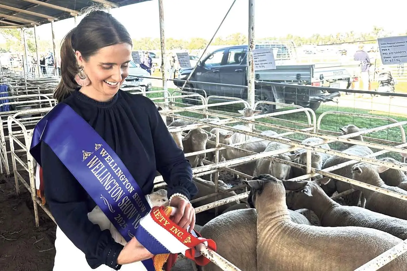 <p>Wellington Show 2025 Young Woman winnerClair Stiff, with some prize-winning sheep at last year\\u2019s event. Photo: Supplied. </p>\\n