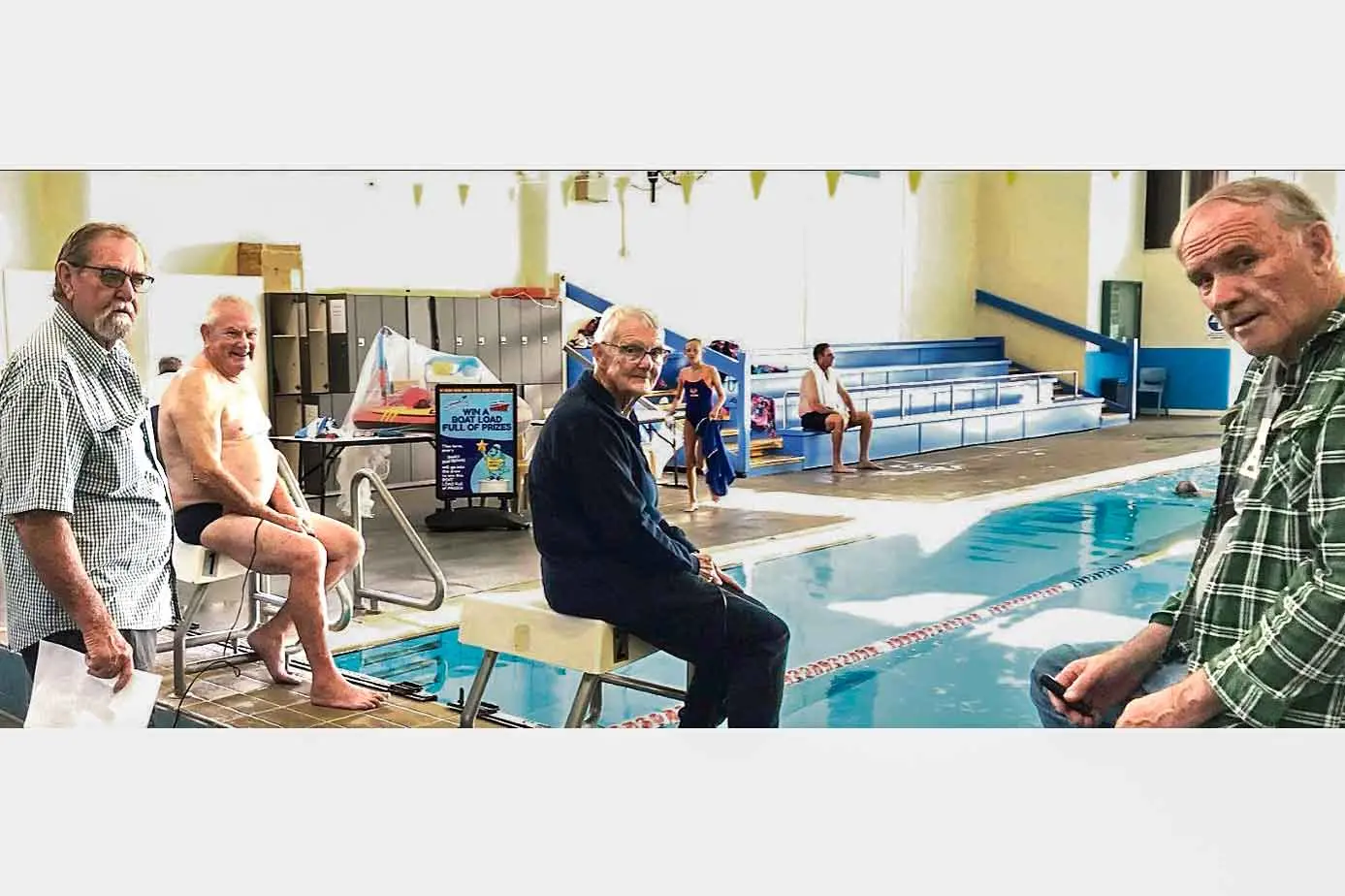 <p>Time-keeping in comfort with Ducks volunteers, Rob Rich, Judy Walsh, and Greg Salmon, with David Sparkes helping on the desk. Photo: Supplied</p>\\n
