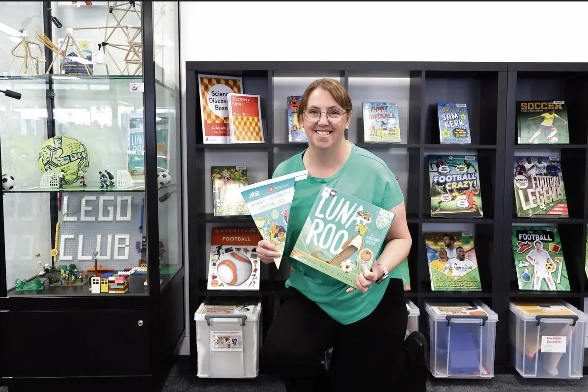<p>Dubbo Library\\u2019s Suzie Samson with the book, \\u201CLuna Roo\\u201D. Stimulating and simultaneous, Dubbo and Wello Libraries are again taking part in the national storytime event on Wednesday, May 27 from 12pm. Photo: Supplied</p>\\n