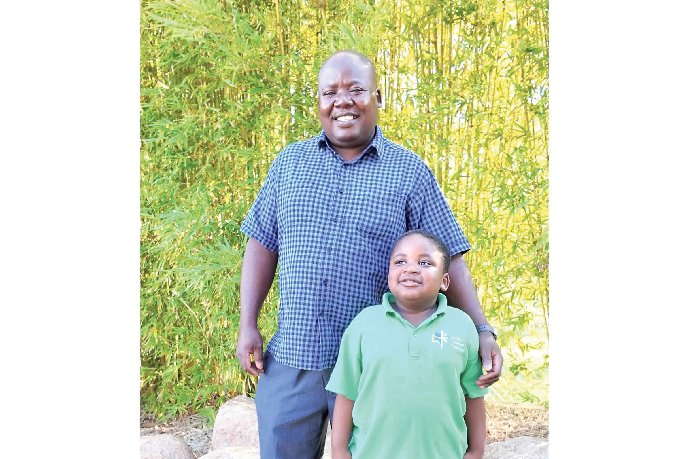 <p>Ableman Garwe and son Micah. Photo: Dubbo Photo News. </p>\\n
