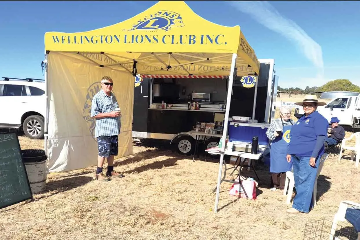 <p>Serving hot food for hot racers, Wellington Lions members outside the catering van. Photo: Supplied</p>\\n