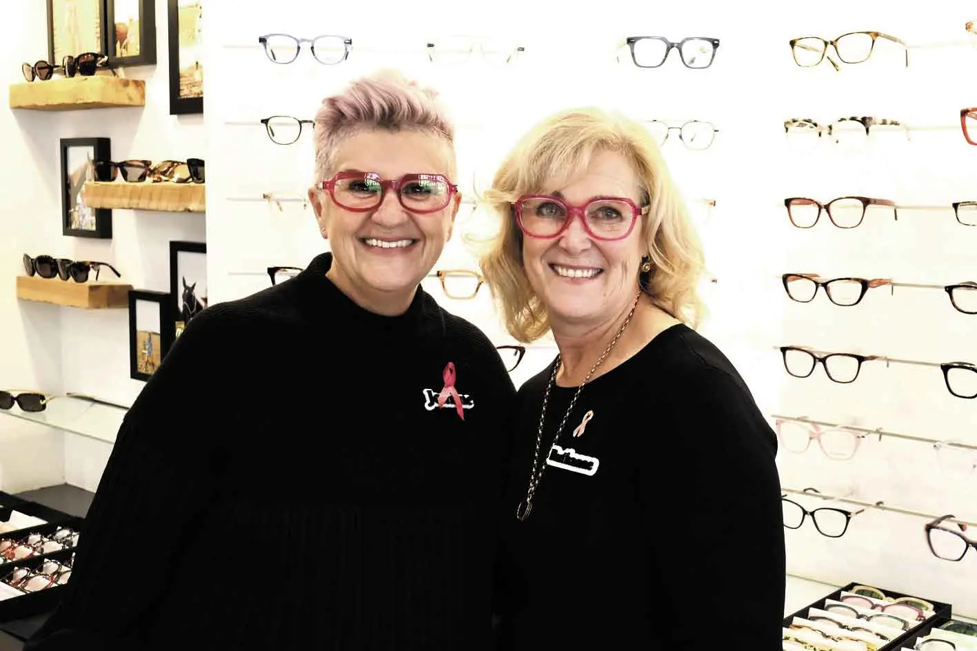 Optometrist team takes the \"Go Pink Pledge\" for breast cancer awareness