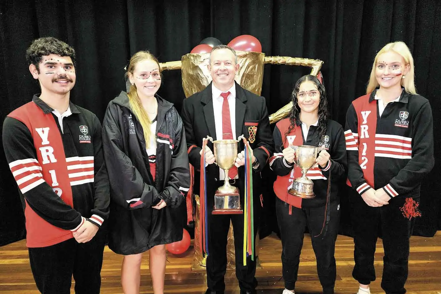 <p>Dubbo College Senior Campus School Captains, Jayden and Gabriella, Principal Glen Braithwaite, and Sports Captains Miley and Millie with the Astley Cup and the Mulvey Cup (Debating). Photo: Dubbo Photo News/Ken Smith</p>\\n