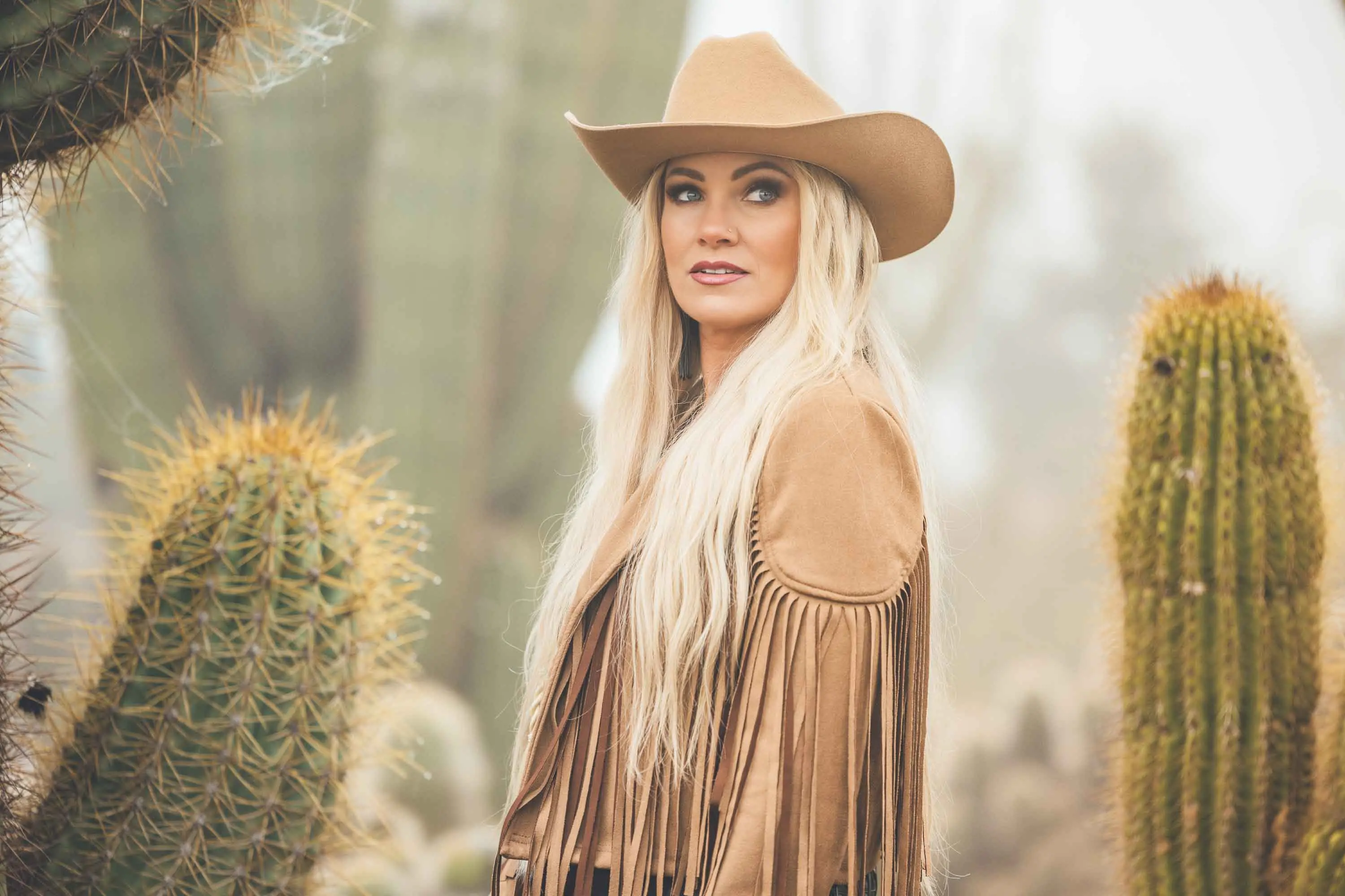 <p>Australia\\'s highest-selling female country artist Hayley Jensen traded a corporate career to follow her muse. Photo: AAP/Supplied</p>\\n