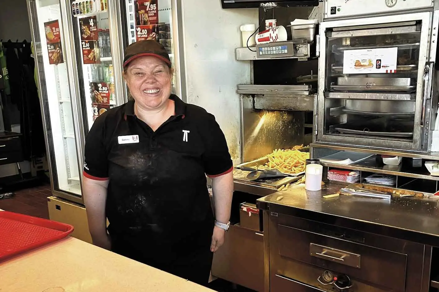 <p>Sammi enjoying her job at KFC. Photo: Social Futures.</p>\\n