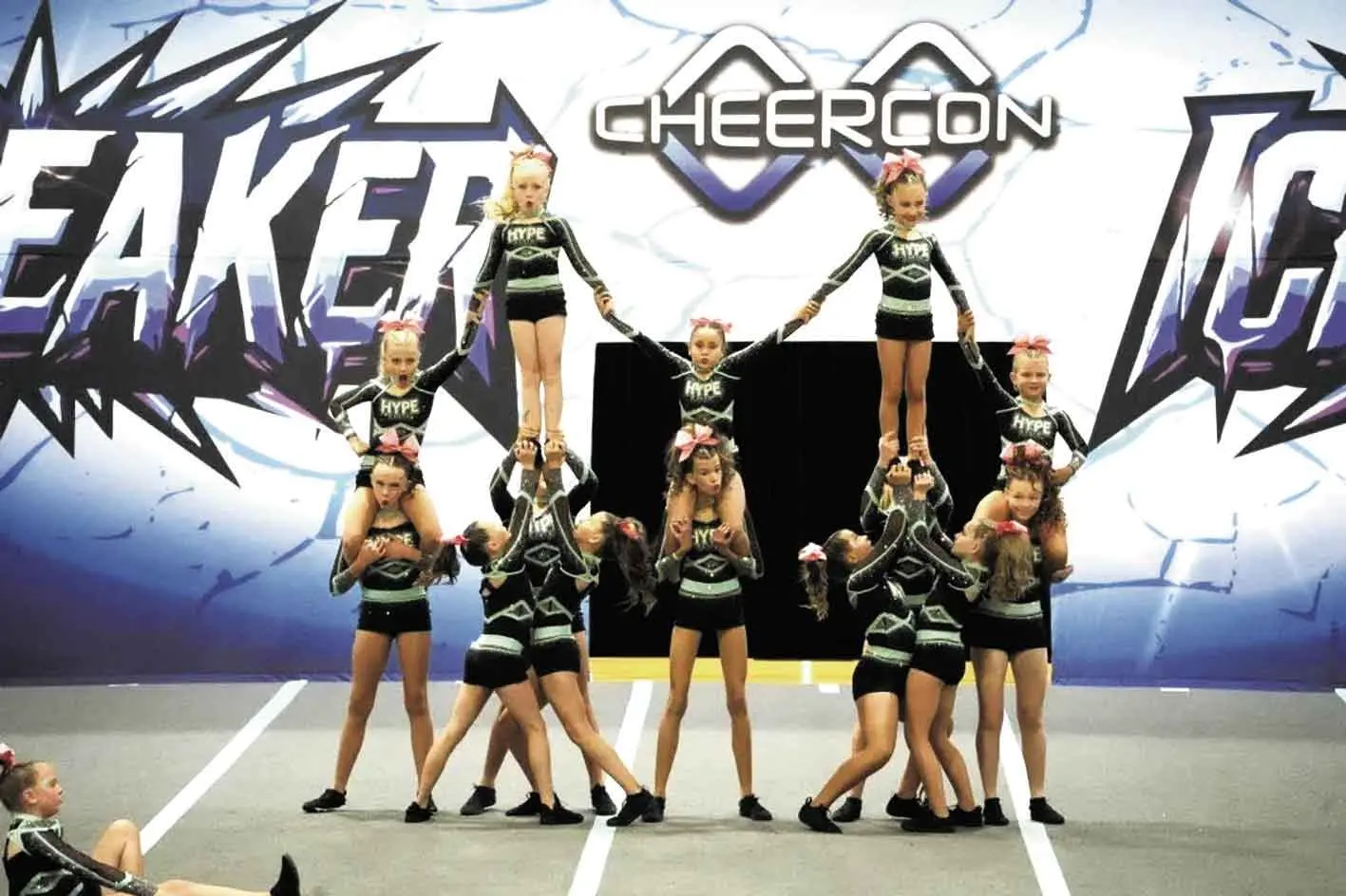 <p>Standing tall, the cheerleaders in Hype Elite team Eclipse Level One. Photos: Hype Elite</p>\\n
