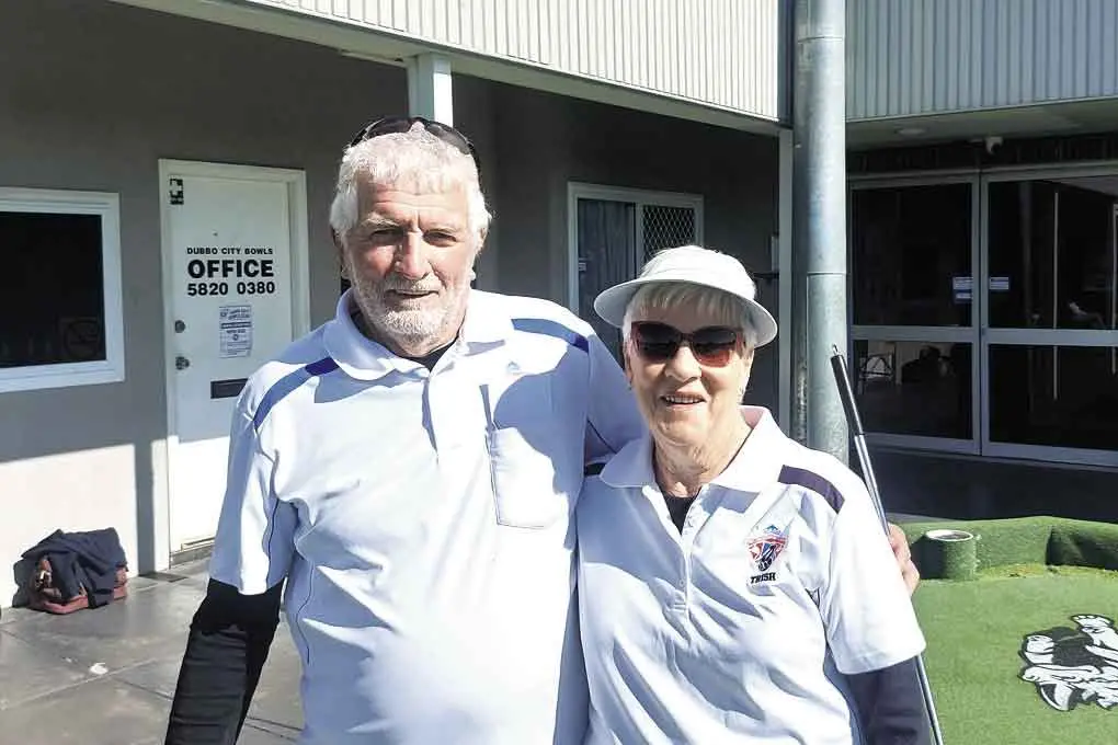 <p>Opponents all smiles: The Phantom, Paul Goodstat, with Trish Gosper at Dubbo City Bowls, Sporties. Photos: Dubbo City Bowls</p>\\n