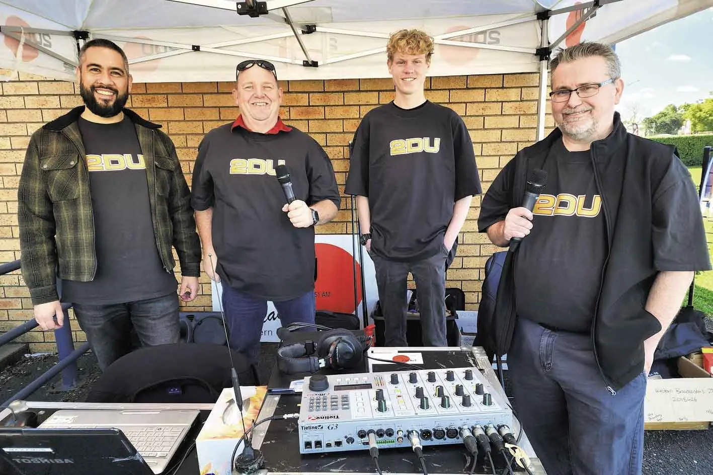 <p>Torin Jones, 2DU/ZOO FM General Manager, with Craig Bassett, Cooper Hatenfel, and Bret Murray at the outside broadcast on July 24. Photo: Dubbo Photo News/Ken Smith</p>\\n