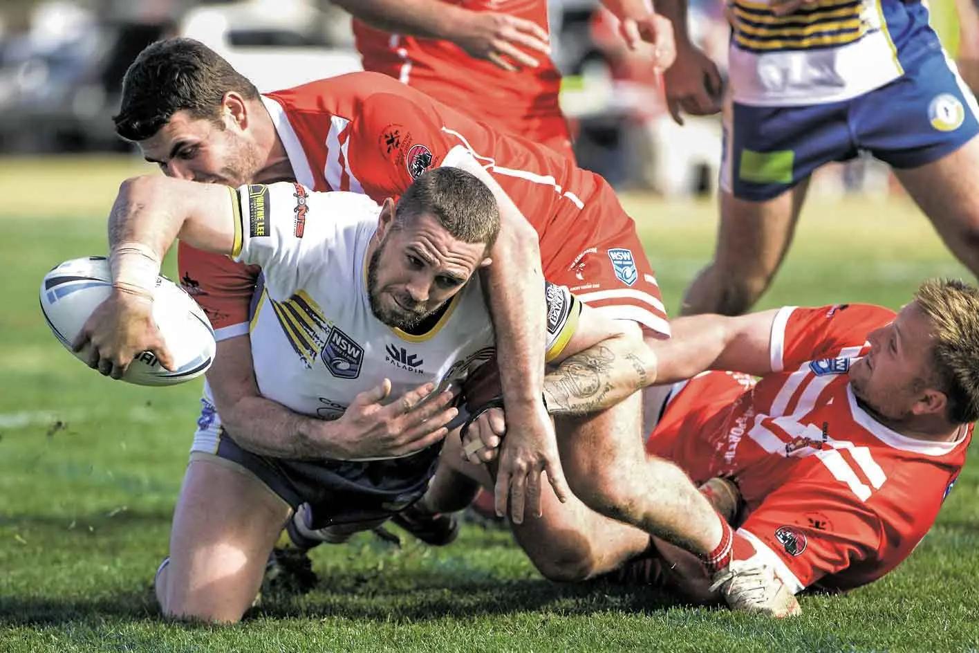 <p>Coonabarabran Unicorns\\u2019 full-back Josh Nixon reaches-out for the line to score as Coolah Kangaroos players hang-on grimly in their finals match-up over the weekend. Photo: Peter Sherwood Photography and Framing.</p>\\n